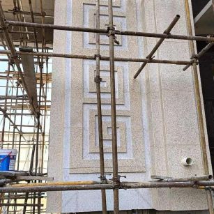 儋州 黄金麻花岗岩别墅外墙干挂回纹造型效果