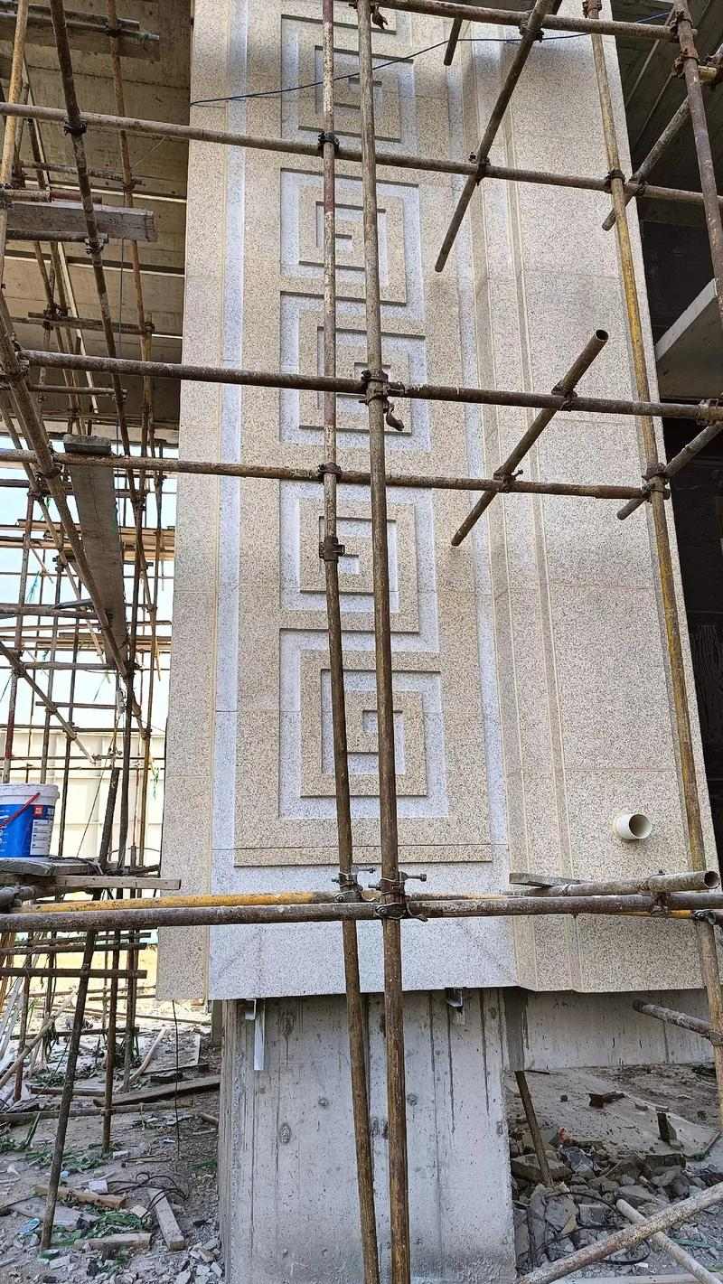 儋州 黄金麻花岗岩别墅外墙干挂回纹造型效果