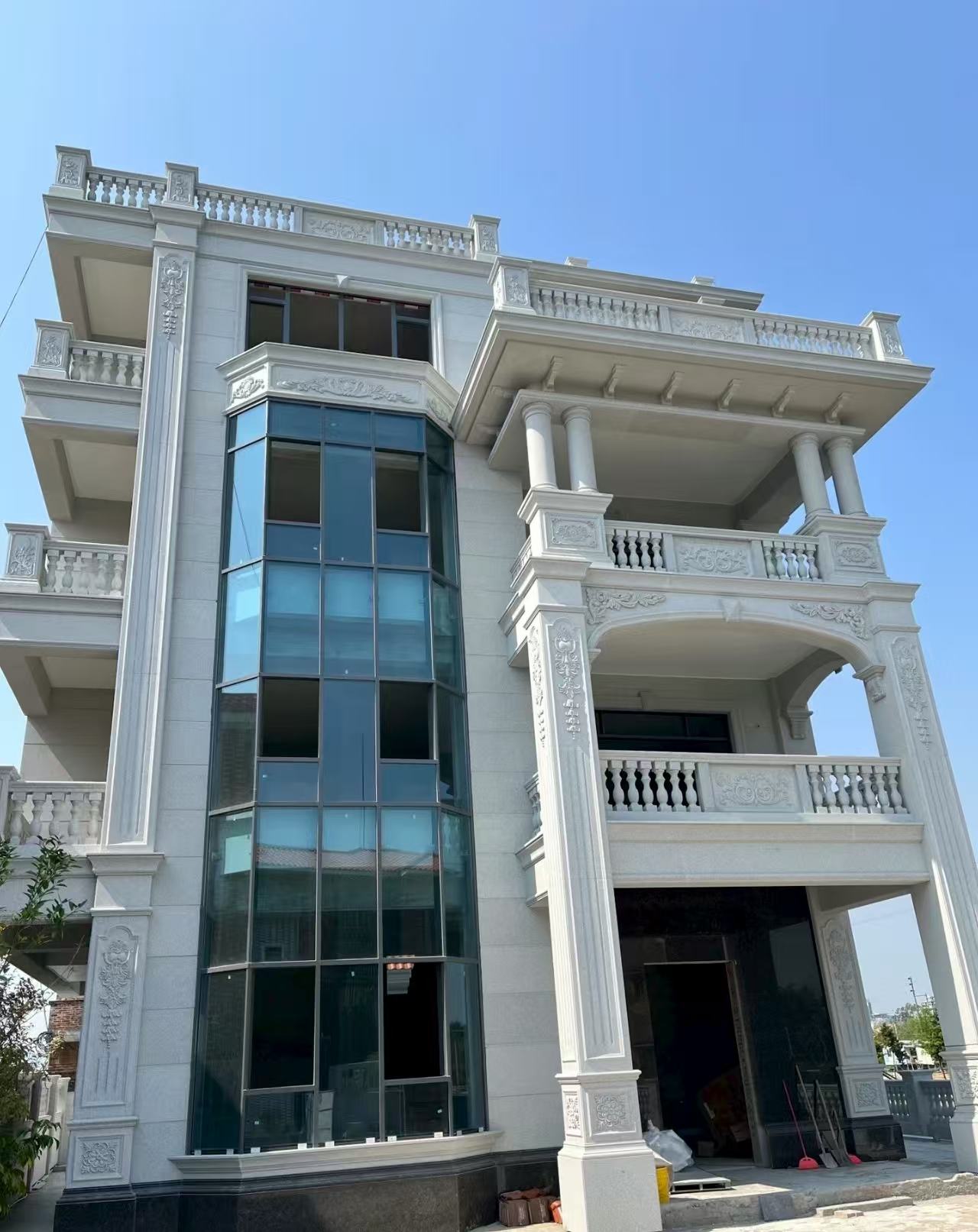 儋州 白麻花岗岩别墅外墙干挂效果展示