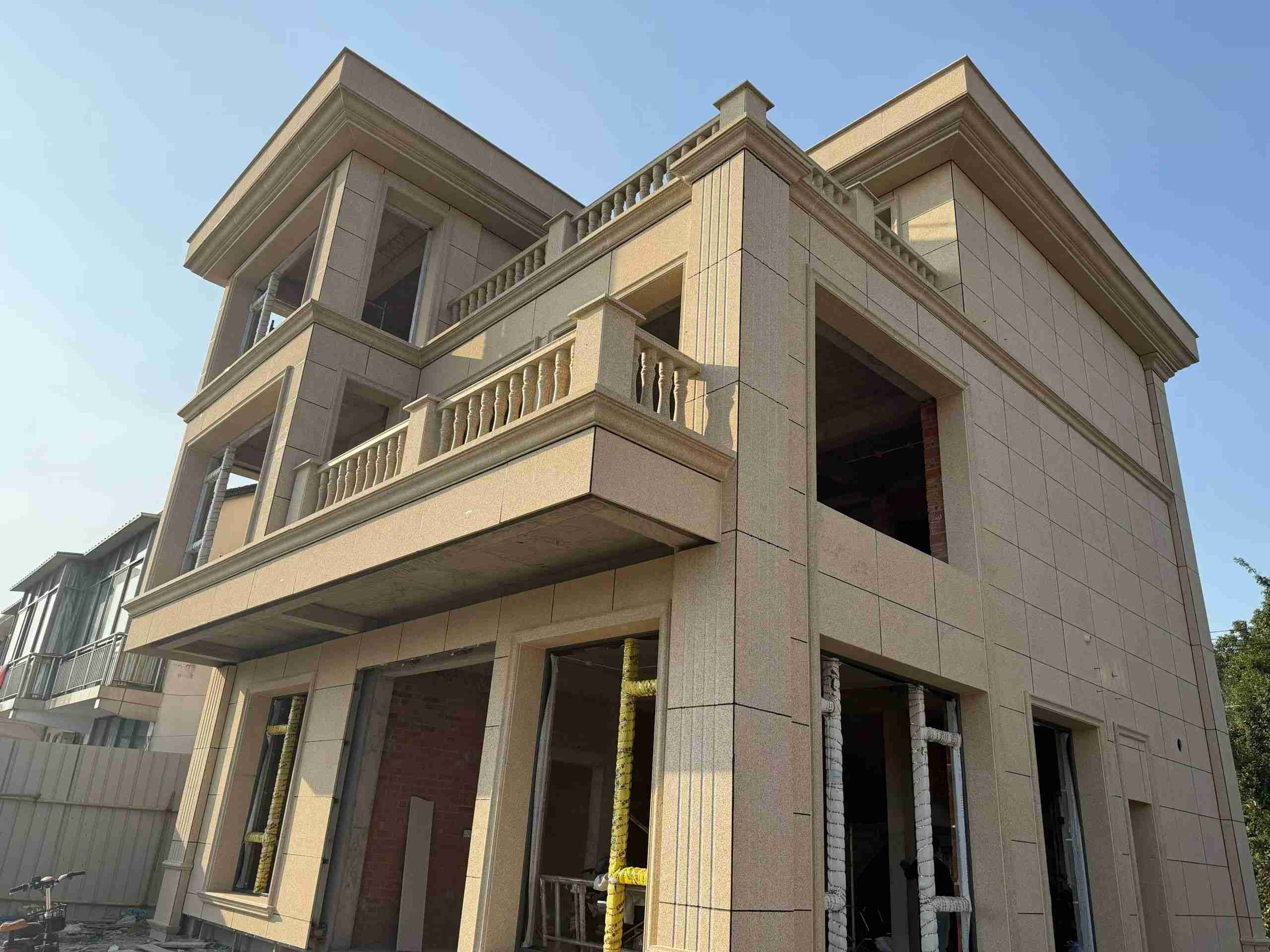 儋州 黄金麻花岗岩石材荔枝面外墙干挂效果展示